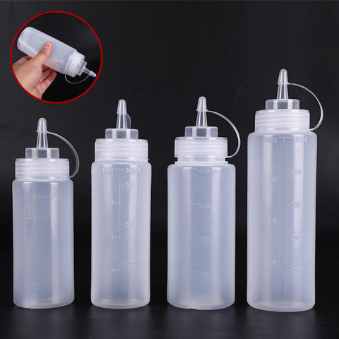 Squeeze Bottle with Scale, Lid, and Tip for Multi Use Clear Color