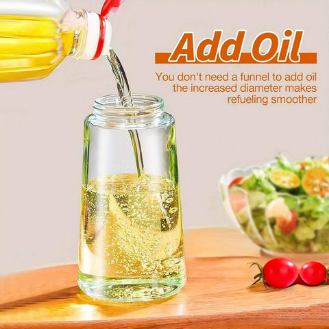 Oil sprayer misting a salad