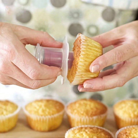 Cupcake Corer pressing into a cupcake Munchies Tools
