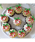 Cupcakes decorated with fondant wreath pieces