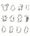 Christmas cookie cutter shapes laid out