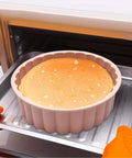 Deluxe Fluted Round Silicone Cake Mold baking in the oven Munchies Tools