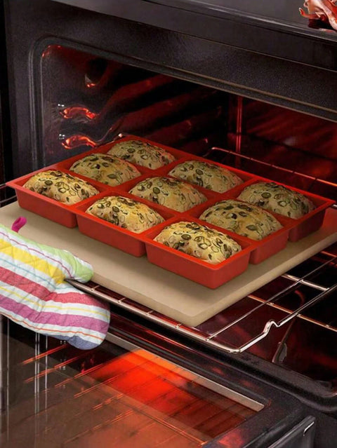 Mini loaves baking in silicone mold in oven
