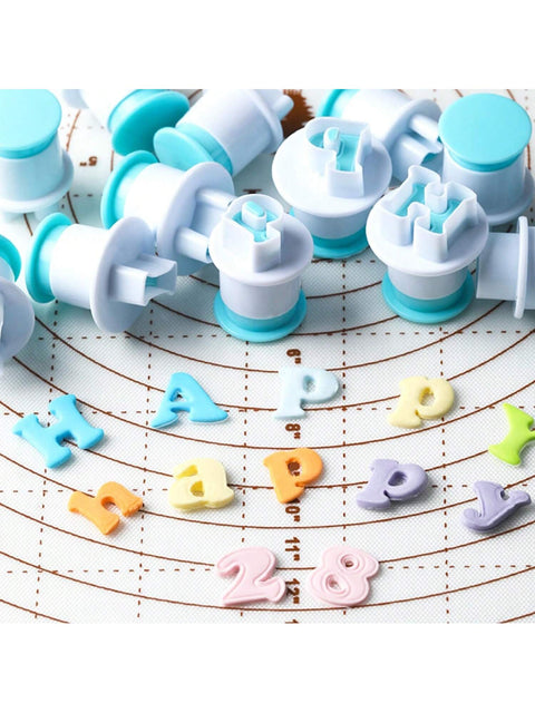 Alphabet plunger stamps close up