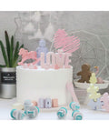 Fondant letters on celebration cake