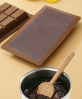 Filling chocolate bar mold