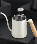 Thermometer on white gooseneck kettle