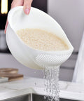 Rice washer strainer bowl draining water