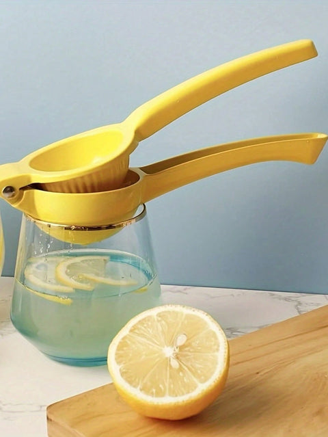 Lemon squeezer over glass