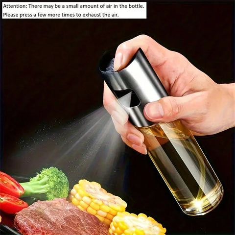 Fine mist oil spray over vegetables