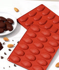 Madeleine shell silicone mold with baked madeleines