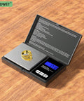 Pocket scale with gold ring