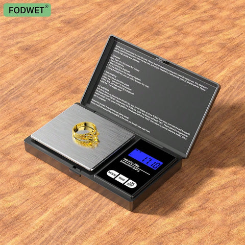 Pocket scale with gold ring