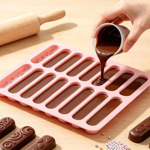 Pouring chocolate into long bar mold