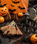 Halloween table with mini hats and brooms