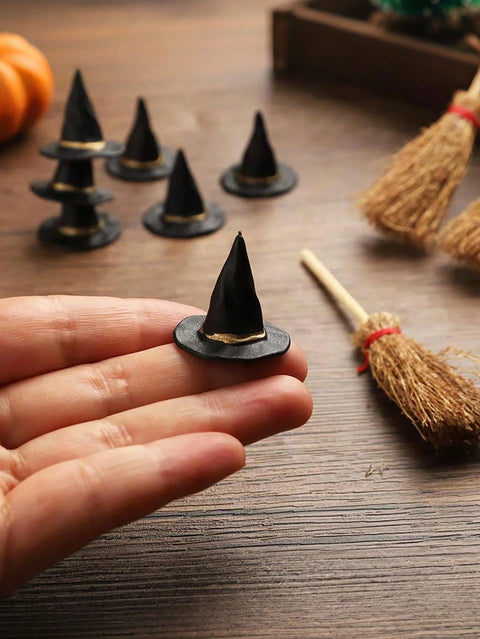 Mini witch hat in hand