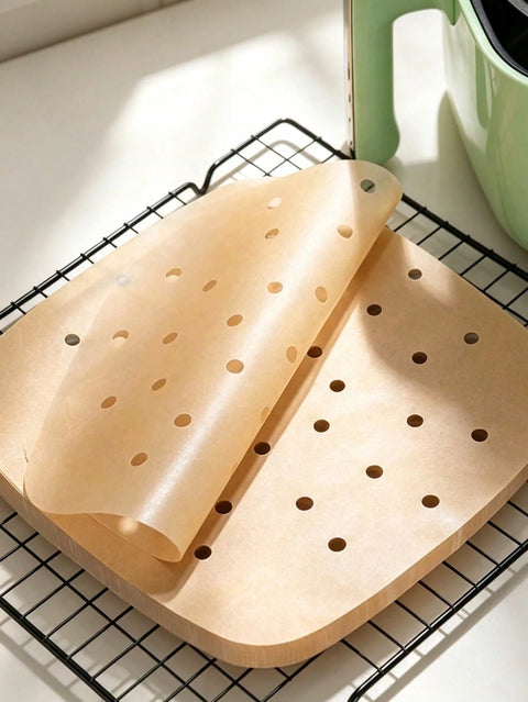 Perforated parchment sheets on rack