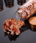 Gold foil flakes in use