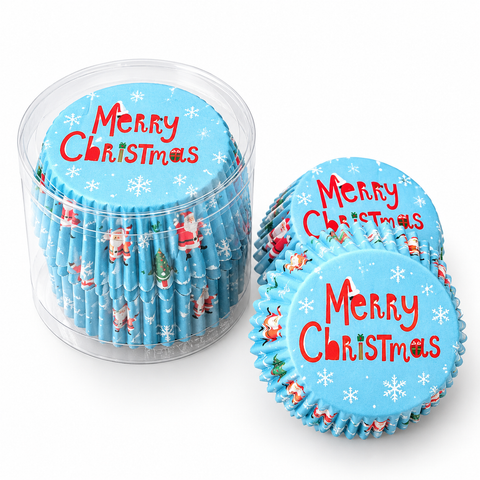 Blue Merry Christmas cupcake liners in a clear container with loose liners